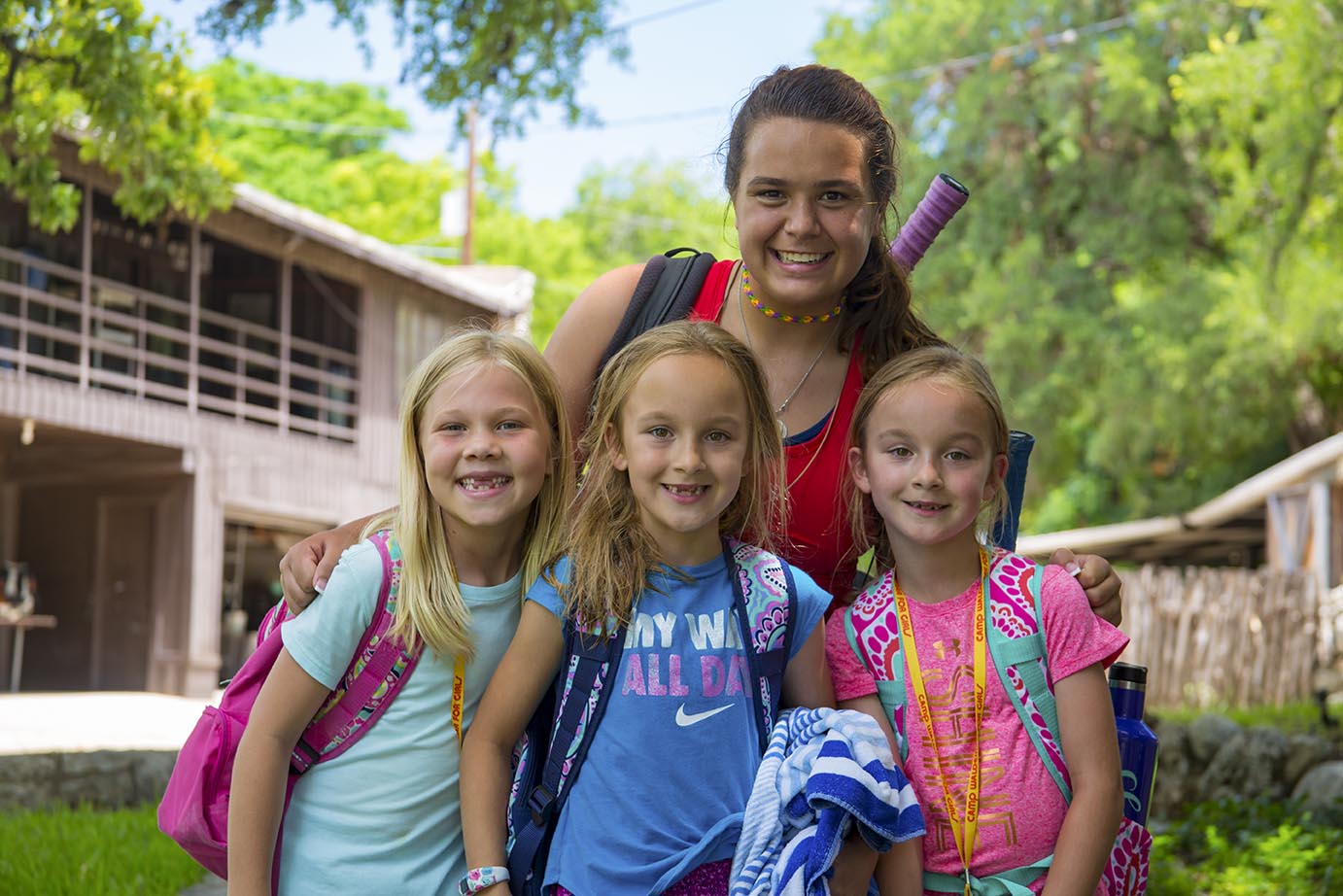 A camp guide with young girls